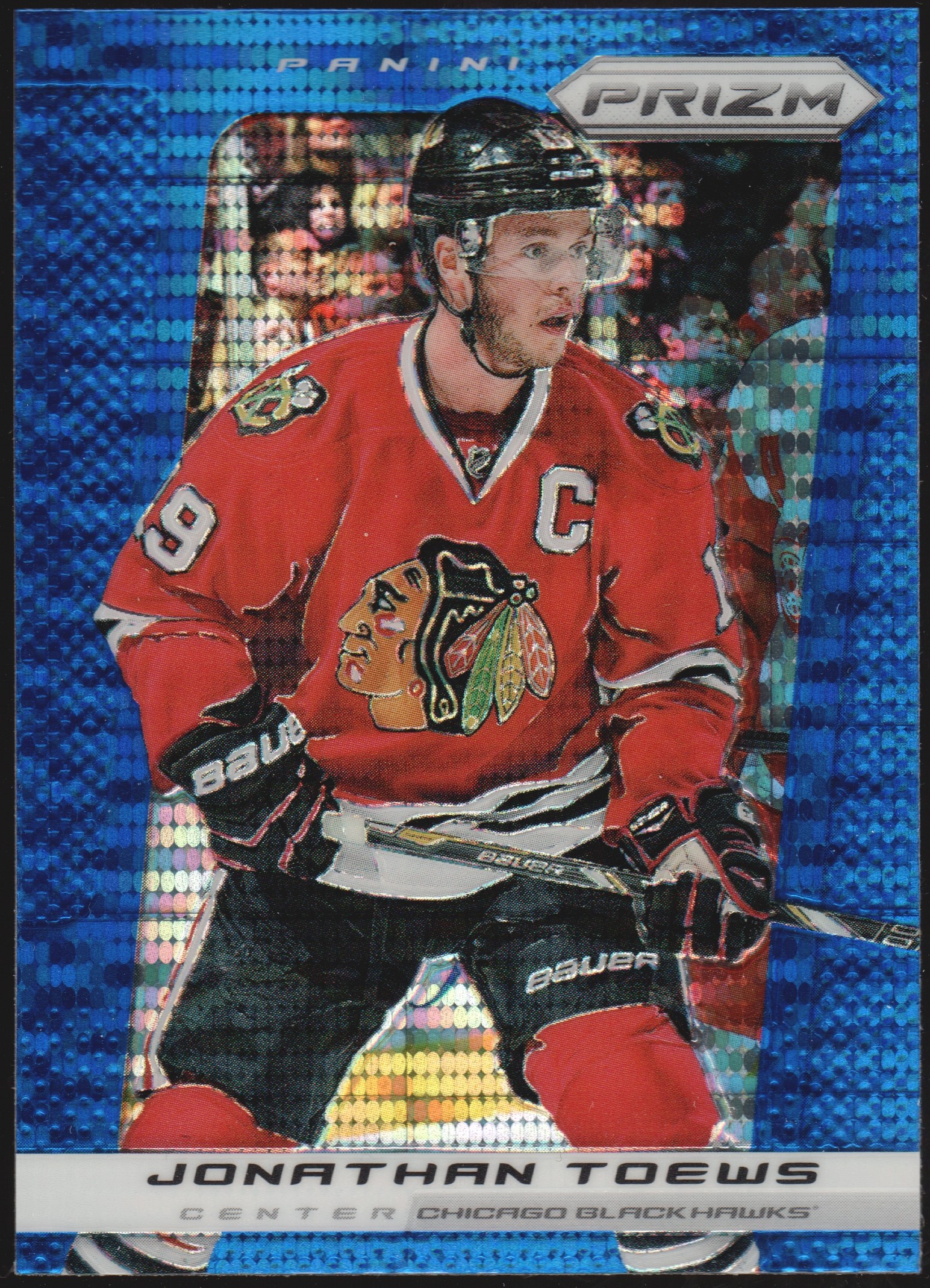 2013-14 Panini Prizm Prizms Blue Pulsar #122 Jonathan Toews (image for) 2013-14 Panini Prizm Prizms Blue Pulsar #122 Jonathan Toews